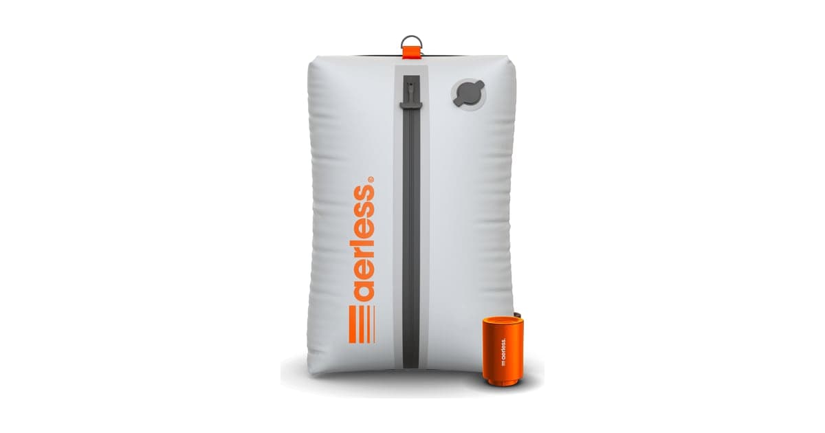 A grey travel vacuum bag with an orange zip pull standing upright beside a small orange battery pump