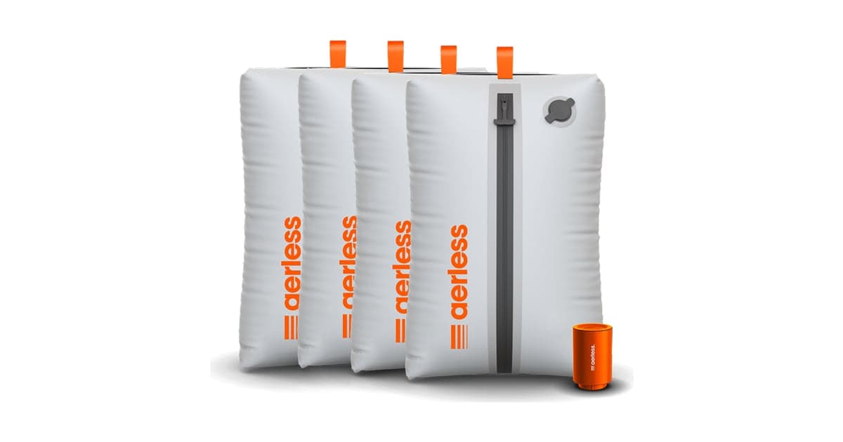 Four grey Aerless vacuum bags with orange zip pulls standing in a row beside the small orange Aerless pump